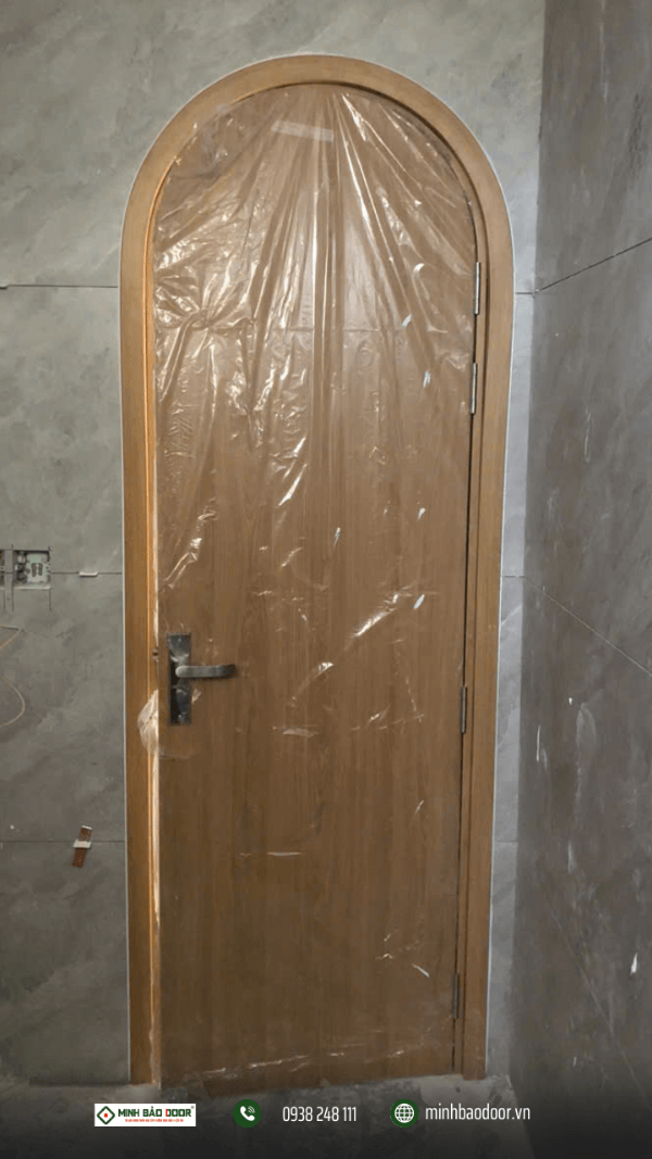 Anh Cảnh - chủ đầu tư dự án cửa nhựa composite tại Bình Chánh lựa chọn mẫu cửa vòm trơn cho cửa nhà vệ sinh